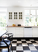 White country-house kitchen with chequered floor