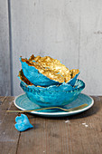 Handmade papier-mâché bowls decorated in blue and gold