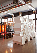 Partition made from hexagonal elements in lobby