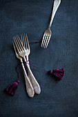Vintage cutlery with hand-made tassels