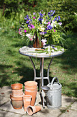 Summery bouquet on garden table