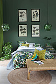 Green bedroom with repeated leaf motif