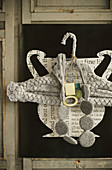 Coat hanger with knitted cover and knitted necklace