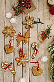 Gingerbread biscuits with red ribbons for hanging on Christmas tree
