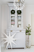 Christmas decorations on white dresser