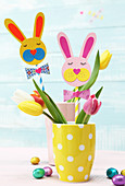 Straws decorated with craft paper Easter bunny faces