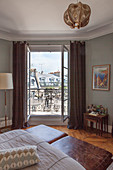 View through bedroom window of Parisian period building