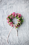 Wreath of crab apple blossom with ribbon