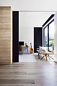 Open sliding door to the home office in the modern architect's house