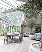 Large, elegant interior with glass roof and conservatory