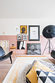 Gallery of pictures on two-tone wall