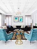 Black upholstered sofas and turquoise armchairs with velvet upholstery in a luxurious living room