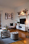 Bohemian-style living room with arrangements of candles