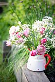 Spring Bouquet With Ranunculus, Tulips And Gypsophila