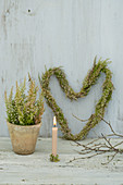 Heather planted in pot, used as candle holder and tied into heart-shaped wreath