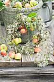Wreath of crab apples and clematis seed heads