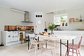 Large, bright, Scandinavian-style kitchen-dining room