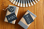 Hand-written name tags on wrapped gifts