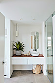 Built-in washstand in the alcove in the modern bathroom