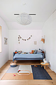 Minimalist children's room with accents in blue
