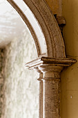 Detail of archway with peeling paint