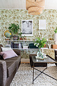 Cosy living room with floral wallpaper