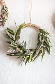 Handcrafted wreath made from leaves, flowers and grasses