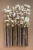 Decoration: handcrafted garden fence of tiny twigs and dried flowers