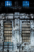 Old factory with barred windows