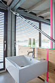 Modern houseboat: simple bathroom with sink and mirror