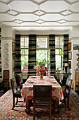 South African cotton print Obama table cloth in dining room with curtains and turkish rug on floor
