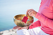 Woman holding a singing bowl