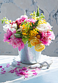 Bouquet of peonies, roses and yellow foxglove