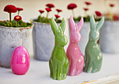 Easter-bunny candles decorating table