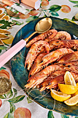 Serving plate with shrimps on a Christmas table