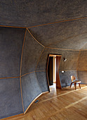 Living room with curved walls in architect-designed house