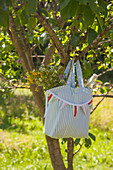 Hand-sewn picnic bag with bunting