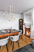 Elegant, eclectic mixture of old and new furnishings in dining room