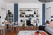 Japandi-style multifunctional interior in blue and white