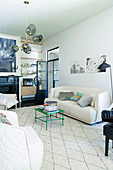 Quilted sofa and white Berber carpet in contemporary living room