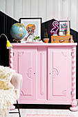 Antique wooden cabinet painted pink