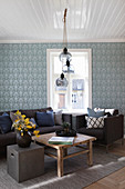 Blue wallpaper in Scandinavian-style living room