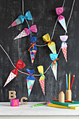 Garland of paper cones for celebrating first day of school