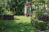 Greenhouse in herb garden