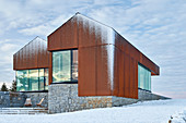 Modern, architect-designed house dusted with snow