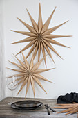 Christmas stars made from wood veneer decorating wall