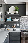 Floating shelves in classic grey-and-white kitchen