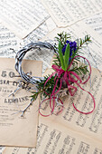 Small wreath with hyacinth on sheet music