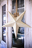 Christmas star with old book pages