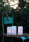 Homemade lanterns from tracing paper painted by children